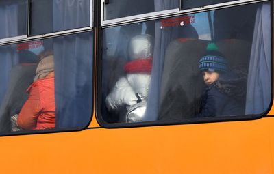 EU must prepare for millions of refugees from Ukraine, commissioner says