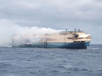 Burnt-out cargo ship with luxury cars sinks off Portugal's Azores