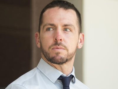 Murder-accused NT cop defends firing shots