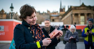 Edinburgh campaigner burns Russian passport in protest over Ukraine invasion