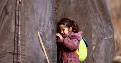 Little girl's heartbreak as she leaves her dad behind after fleeing Ukraine