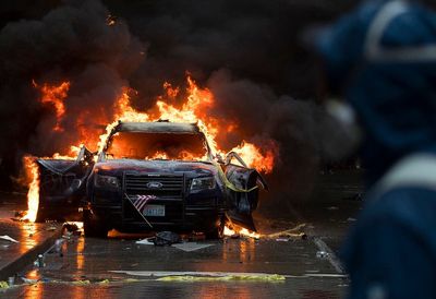 Woman gets 5-year term for police car fires in 2020 protest