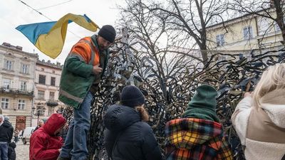 Ukrainians work to deliver 'whatever our country needs', making Molotovs, recovering bodies and rescuing animals