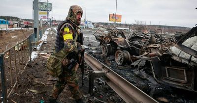 Ukraine morning update as air strikes rock Kyiv, paratroopers land in second city and 40-mile convoy nears capital