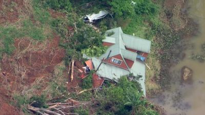 Multiple landslides in Main Arm send house falling down mountainside, residents set up pulley system to deliver supplies