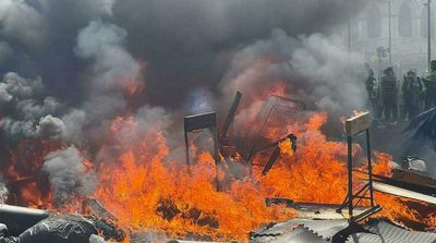 New Zealand Protesters Burn Camp after Riot Police Move In