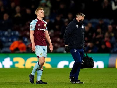 Burnley face anxious wait to discover full extent of Ben Mee knee injury