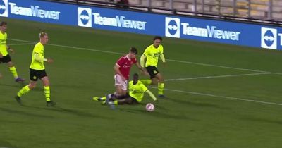 Man Utd youngster leaves defender on floor with cheeky nutmeg before classy finish