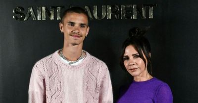 Romeo Beckham, 19, towers over mum Victoria at Paris Fashion Week