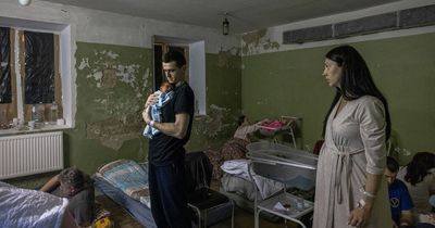 Dad cuddles tiny baby born in Kyiv bunker as Russia rains terror down on Ukraine