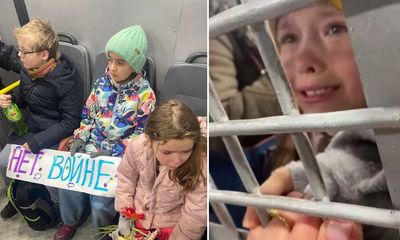Moscow police detain children for laying flowers at Ukrainian embassy