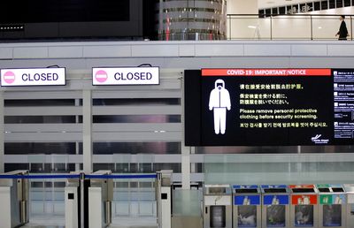 Japan set to extend coronavirus limits, ease border rules