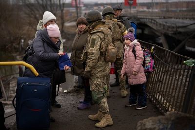 Ukraine-Russia news - live: Huge explosions in Kyiv overnight as Kherson becomes first major city to fall