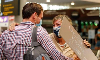 ‘Lots of happy tears’: joy as New Zealand opens border after two years of isolation