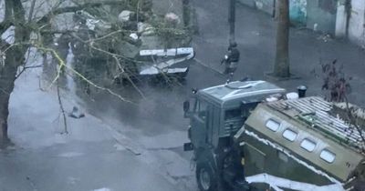 First city in Ukraine 'falls' to Russia as troops storm major building