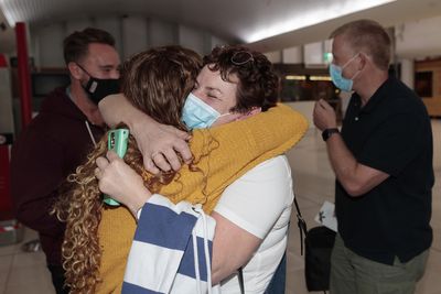 Tearful reunions as Western Australia ends COVID border closure