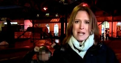 Police investigating after boy 'shoves' BBC reporter in the back while on air
