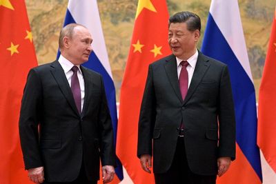 China denies asking Russia not to invade until post-Olympics