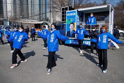 S.Korea candidates woo young voters with 'deepfakes,' hair insurance