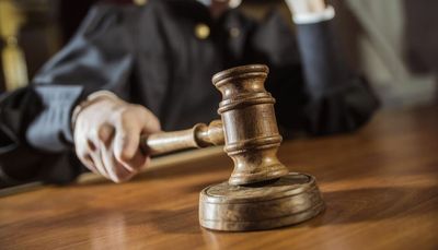 Officer hit by driver using phone survived 27 years on the force, only to be killed ‘simply walking home,’ prosecutor says