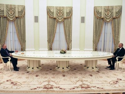 ‘I don’t bite’: Zelenskyy appears to mock Putin’s long table in meeting request