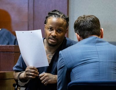 Man held in Vegas hookah lounge killing was among 13 wounded