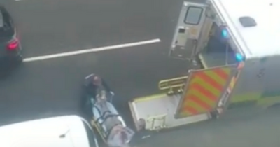Bloody footage shows Uddingston machete attack victim stretchered into ambulance