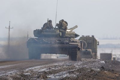 Distraught father sobs over body of son killed by Russian bombardment of Mariupol