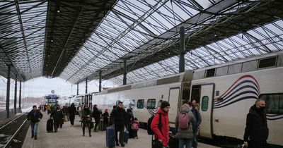 Russians start to flee homeland amid fears Putin will shut borders in angry move