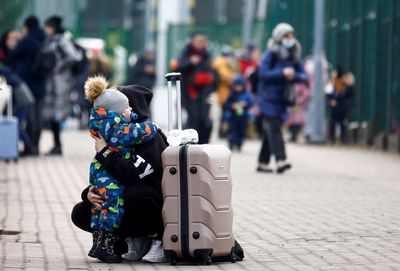 Fearing for relatives left behind, Ukrainians escape over the borders