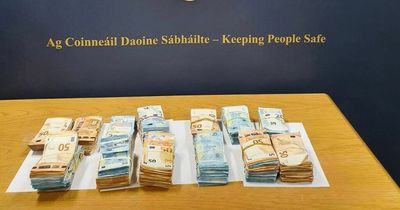 Woman arrested and over €100,000 seized after gardai launch late night raid on city centre home