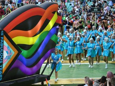 Mardi Gras revellers not fazed by rain