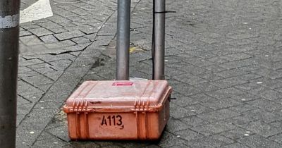 Why these orange boxes tied to lamposts have been spotted all across Cardiff