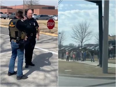 Kansas shooting: Suspect in custody after three people injured in high school