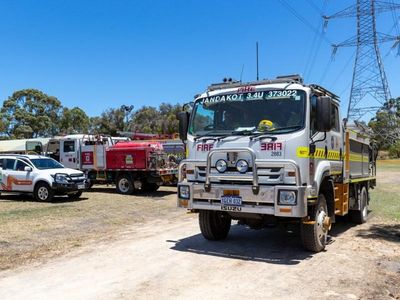 WA bushfire downgraded to watch and act