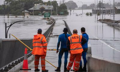 Queensland records 11th flood death; Australia reports 48 Covid deaths – as it happened