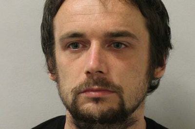 Police manhunt after woman killed in her north London home