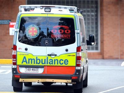 Qld man charged over woman's balcony fall