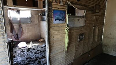 Tweed River caravan park residents devastated by muddy mess from 'biblical' flood near Queensland border