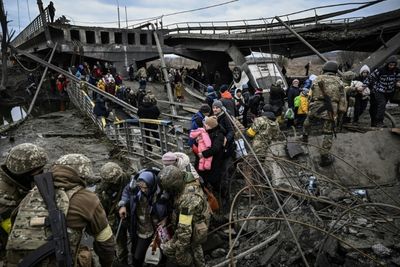 Ukrainians run for their lives from Russian bombs