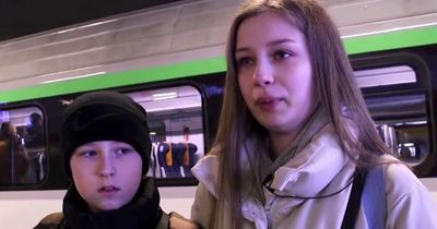 Ukrainian siblings break down in tears after leaving parents behind to fight