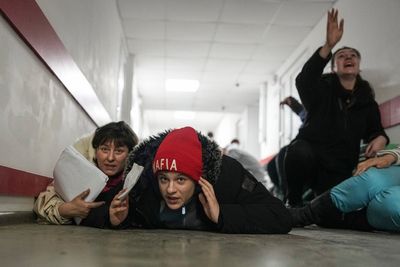 AP PHOTOS: Day 10, Russian shelling batters encircled towns