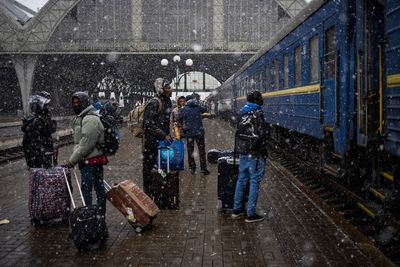 Foreigners who fled Ukraine team up to help others escape