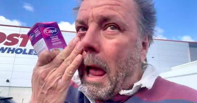 Martin Roberts sobs outside Costco after trying to buy goods for Ukrainian refugees