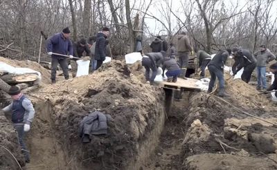 ‘Our country, we have to protect it’: Ukrainians who stay behind