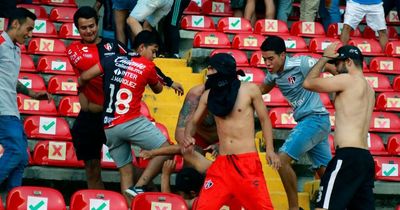 More than 30 detained after 22 injured in brawl between fans at Mexican football match