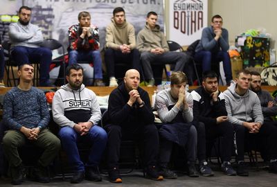 From chef to IT expert, Ukrainian men take crash course in fighting