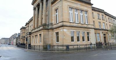 Paisley thug made racist remarks to shop owner before being found with a knife