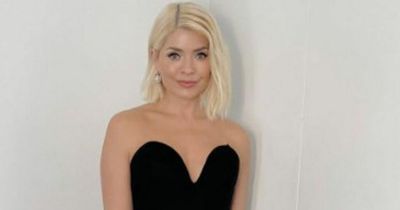 Holly Willoughby dazzles Dancing On Ice fans in strapless corset and silver skirt