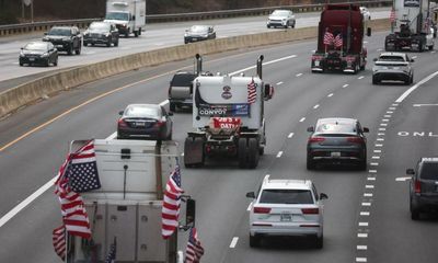 Truck convoy loops around Washington DC to protest Covid restrictions